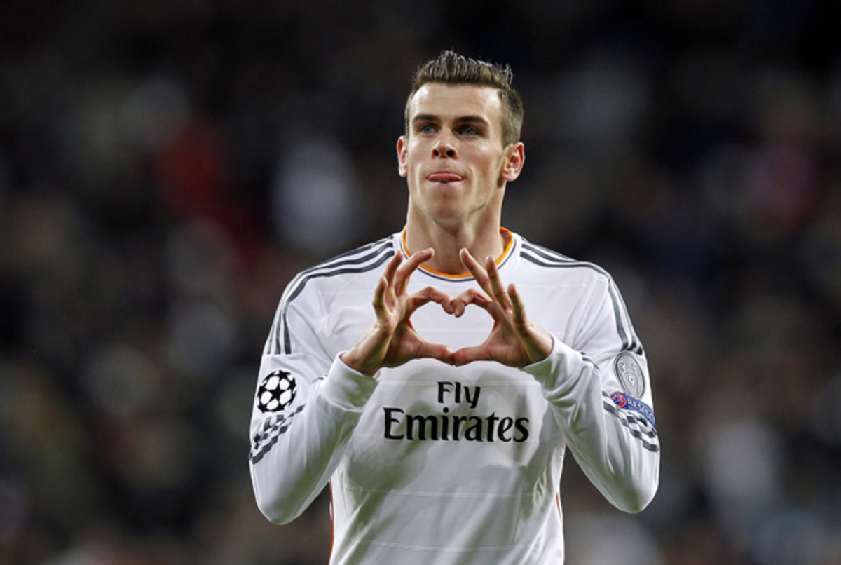 Gareth Bale gives his trademark heart-shaped hands goal celebration after scoring in Real Madrid's Champions League triumph over Galatasaray.