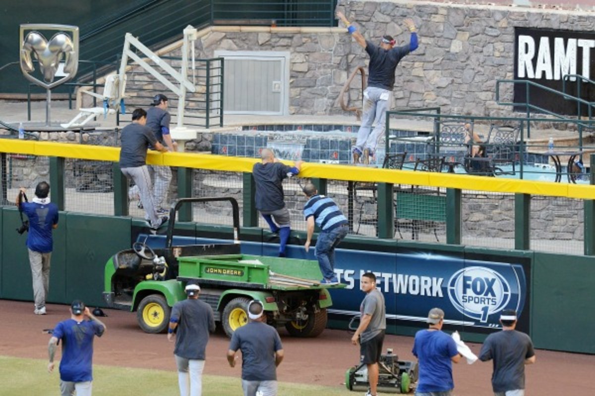 Dodgers players celebrated their NL West title in Chae Field's pool. (Norm Hall/Getty Images)