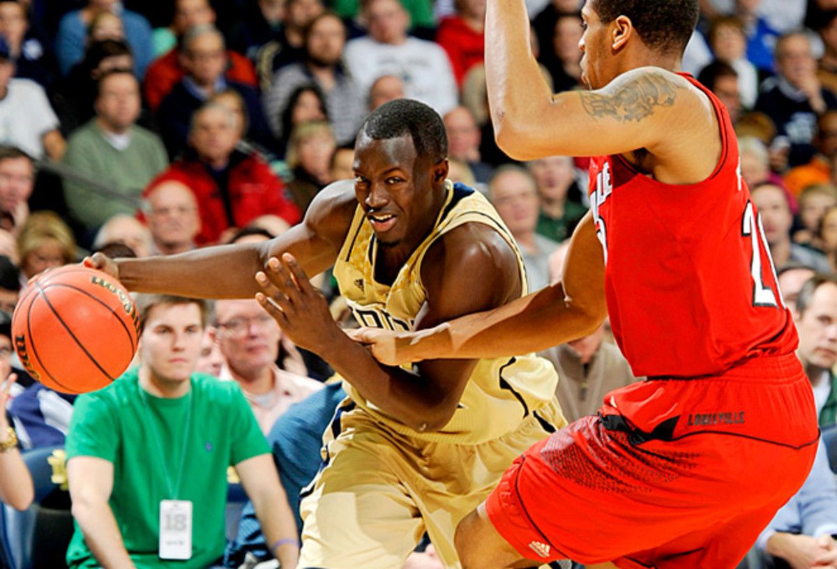 Jerian Grant (left) scored 12 points for Notre Dame in the game's final minute of regulation.