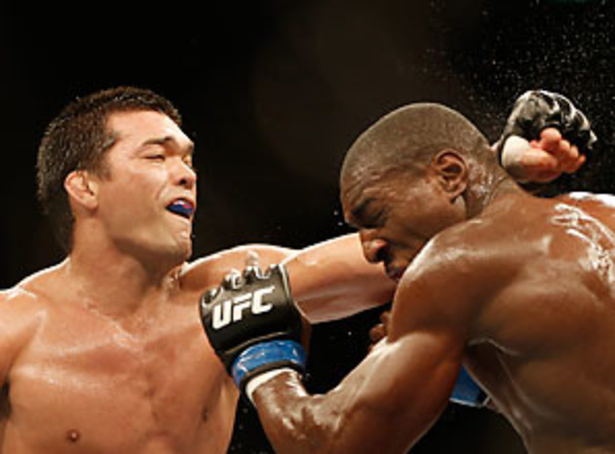 In a decision that upset many in the crowd at UFC 163 Phil Davis (right) won a decision over Lyoto Machida.