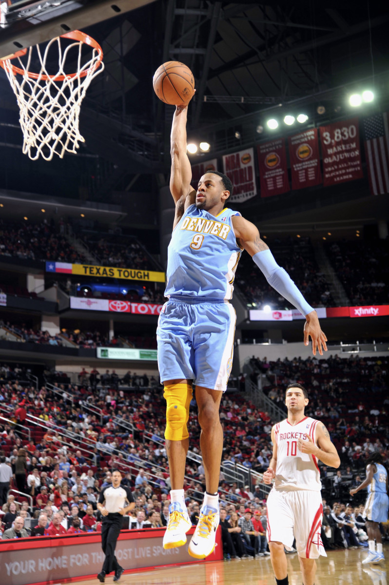 Andre Iguodala scores on one of Denver's many fast breaks. (Photo by Bill Baptist/NBAE via Getty Images)