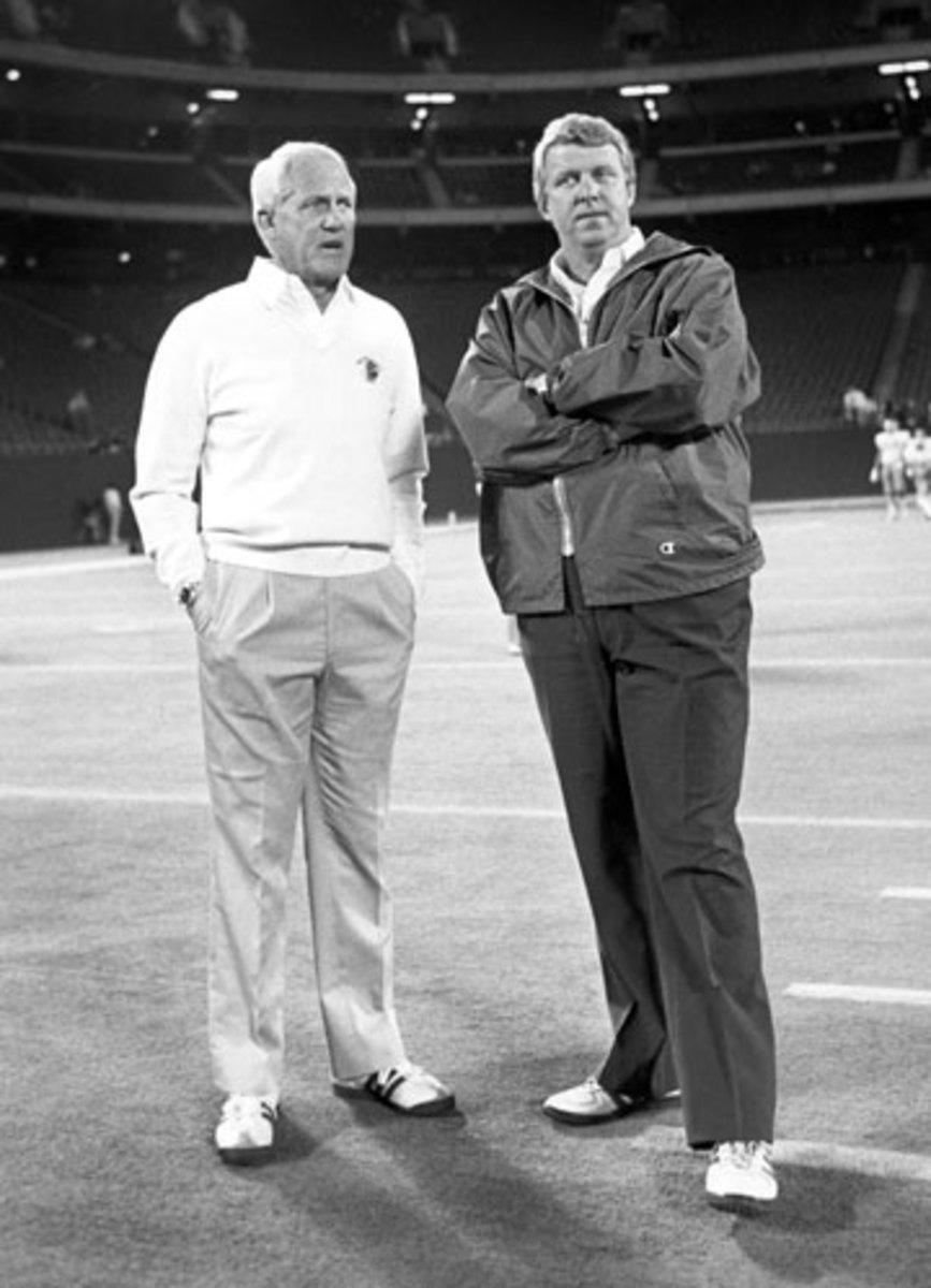 Parcells and Walsh chatting before a Monday night game in October 1987. (Michael Zagaris/Getty Images)