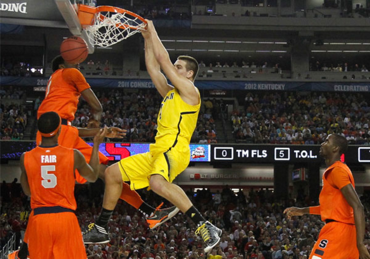 Michigan's Mitch McGary (center) may prove to be to be the difference for the Wolverines on Monday night. (Getty)