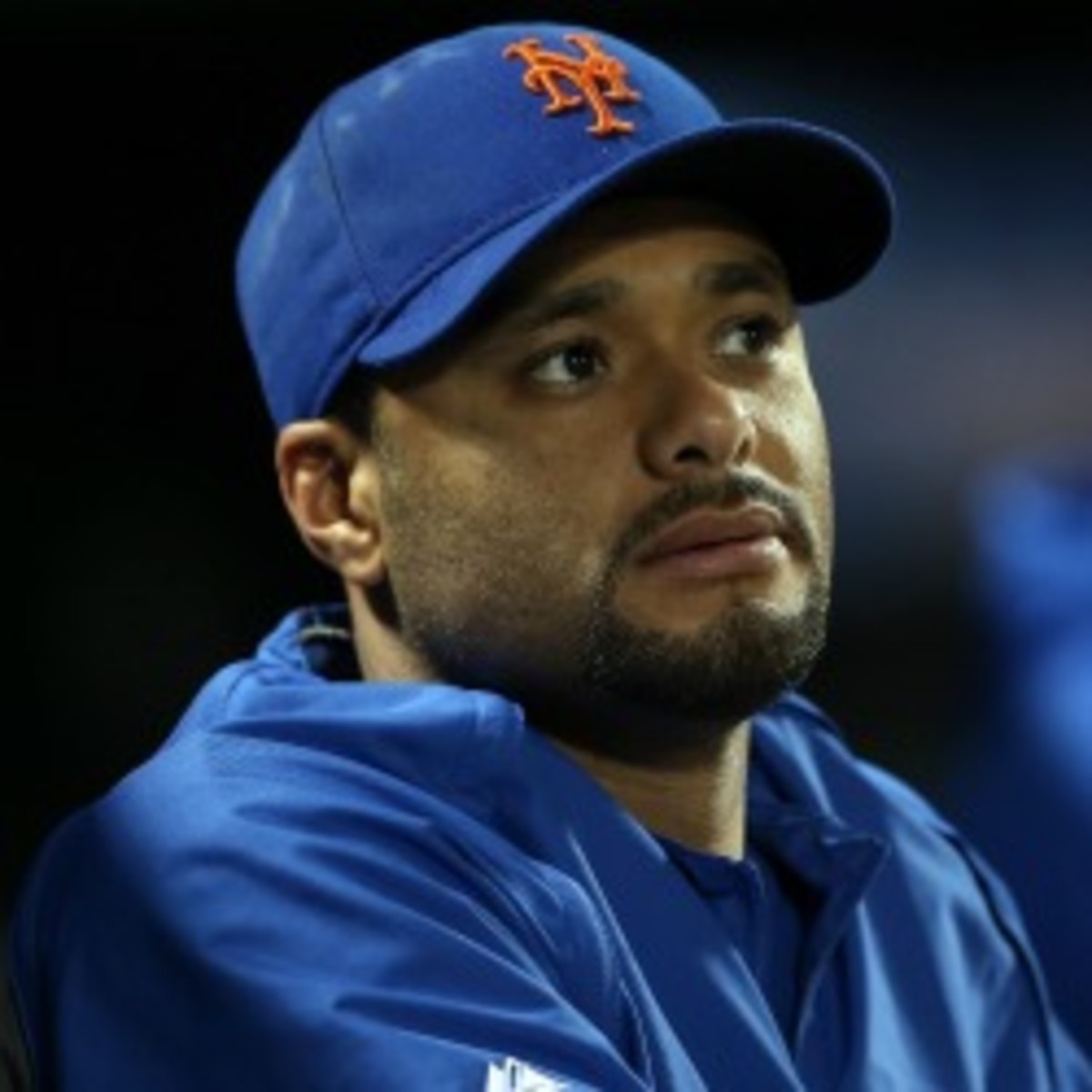 Mets ace Johan Santana showed up to camp out of shape, GM Sandy Alderson told CBSsports.com. (Elsa/Getty Images)