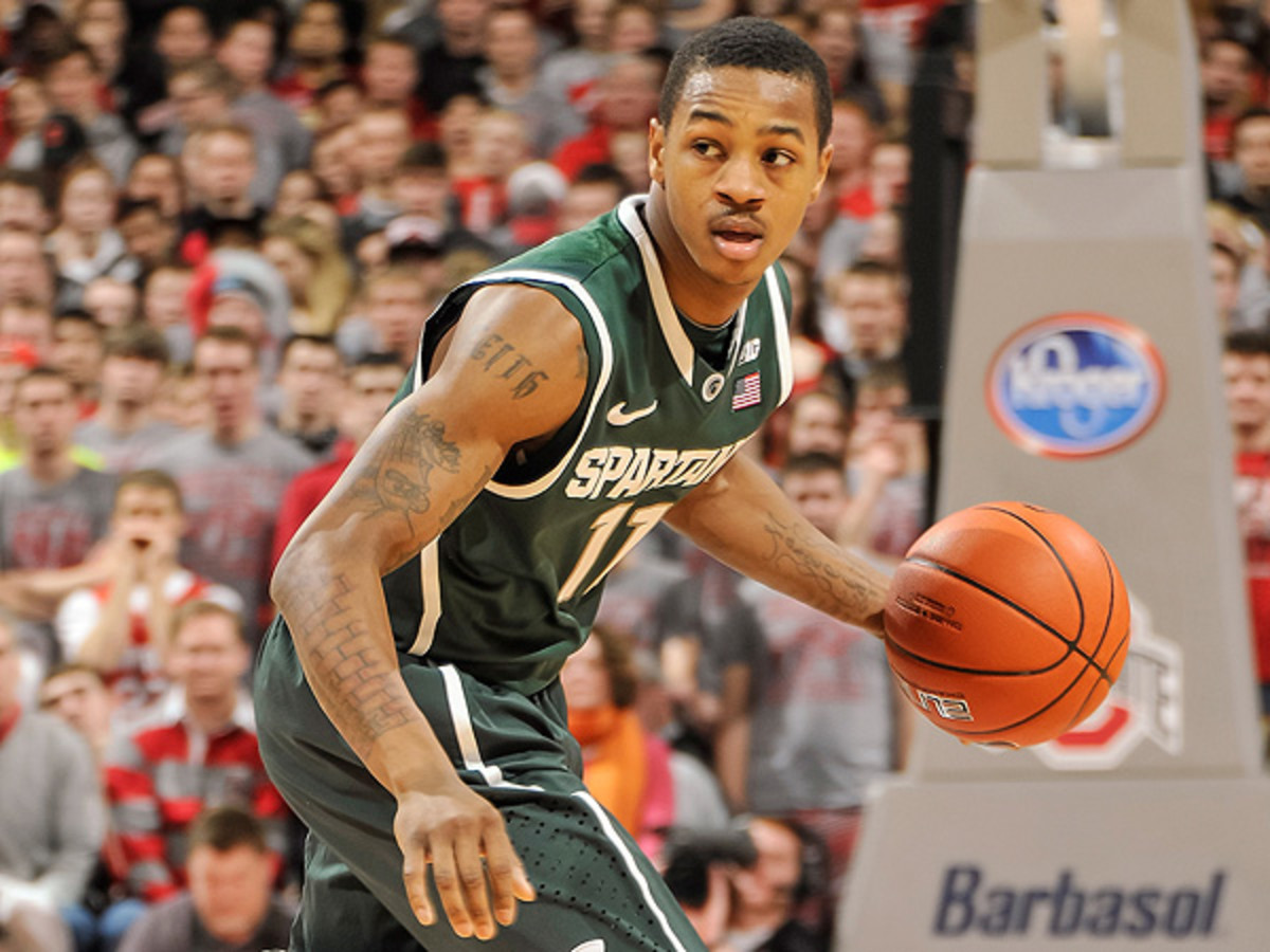 If Keith Appling has progressed this offseason, the Spartans should have a much more fluid and well-rounded attack. (Jamie Sabau/Getty Images)