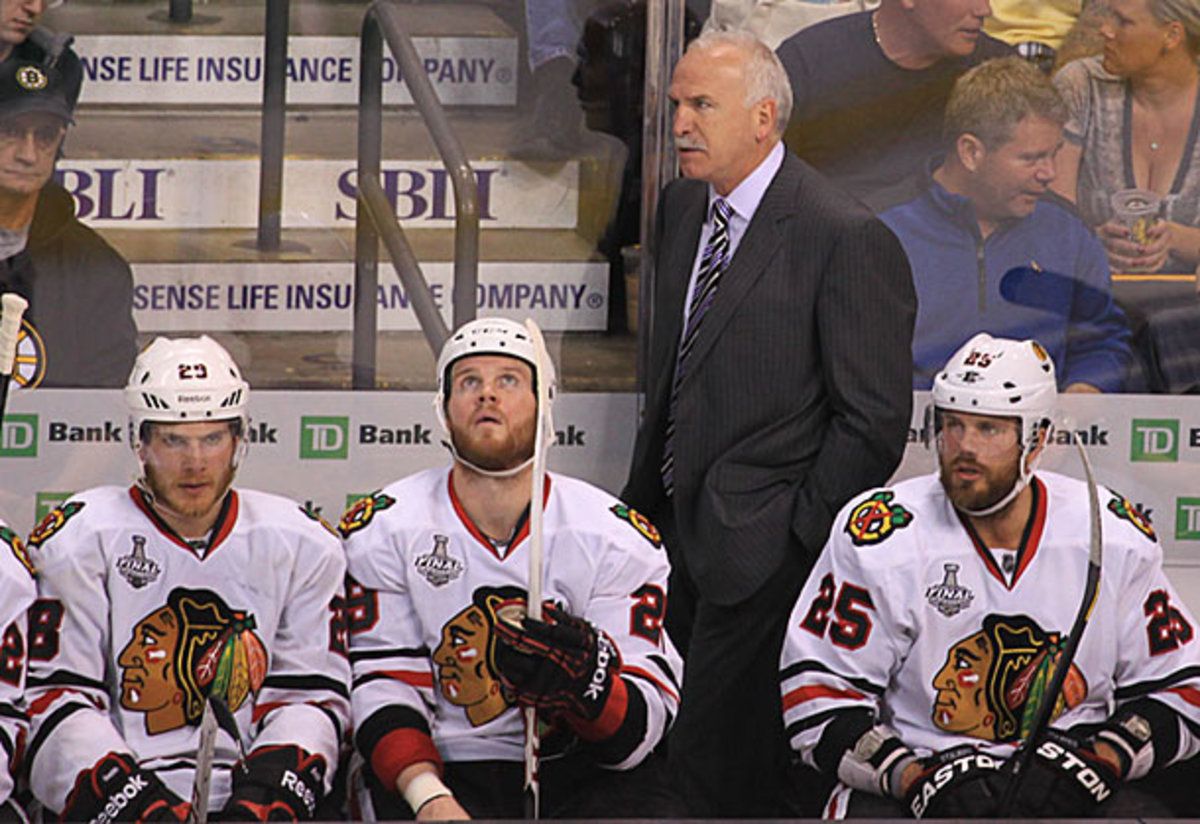 The Blackhawks look on during their Game 3 loss in the Stanley Cup Final.