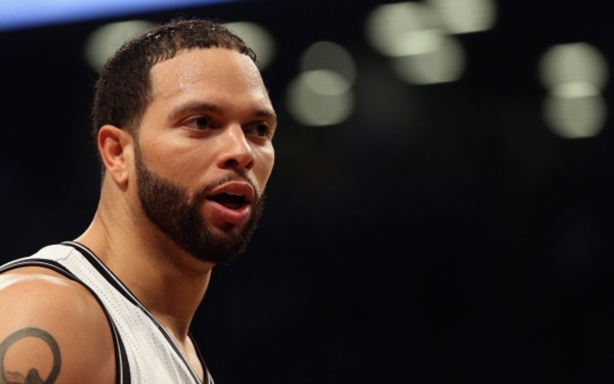 Brooklyn Nets guard Deron Williams is nursing a bone bruise and a sprained ankle. (Bruce Bennett/Getty Images)