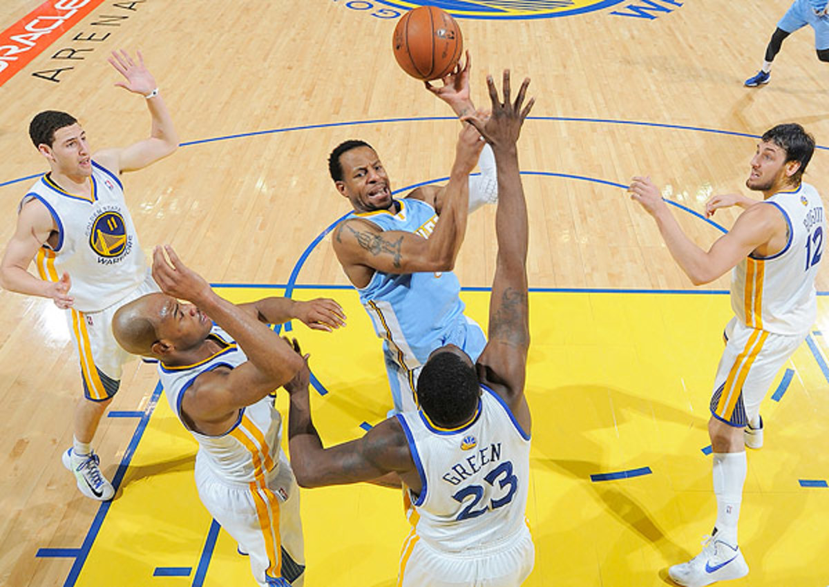 The Warriors added Andre Iguodala (center) to core that made a deep playoff run last season.