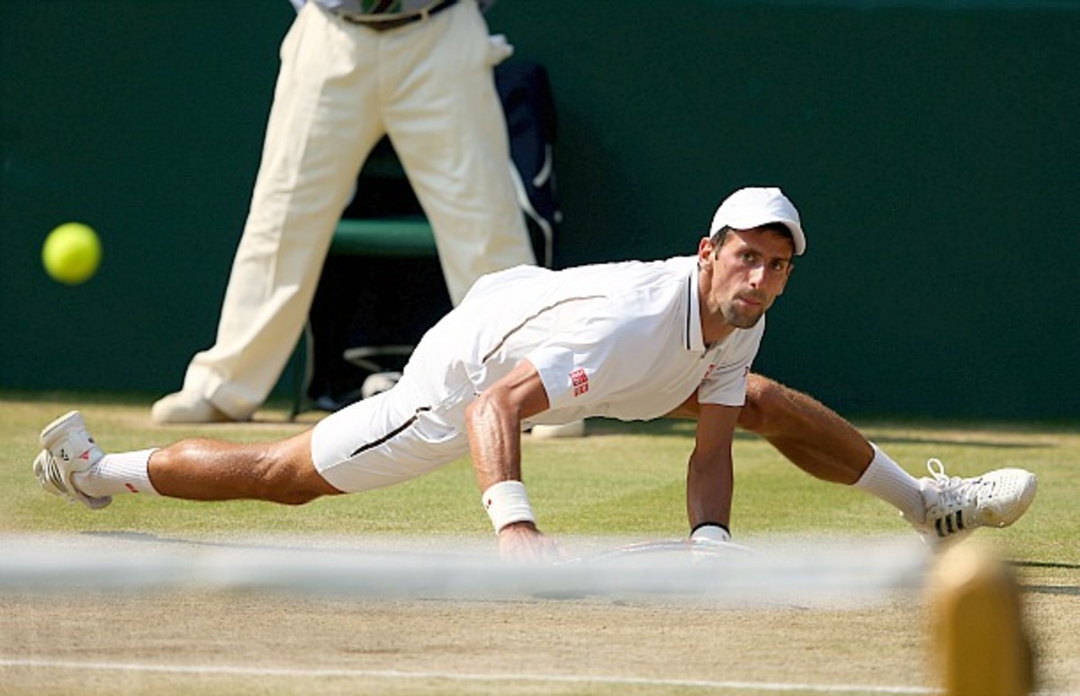 Novak Djokovic defending. (Julian Finney/Getty Images)