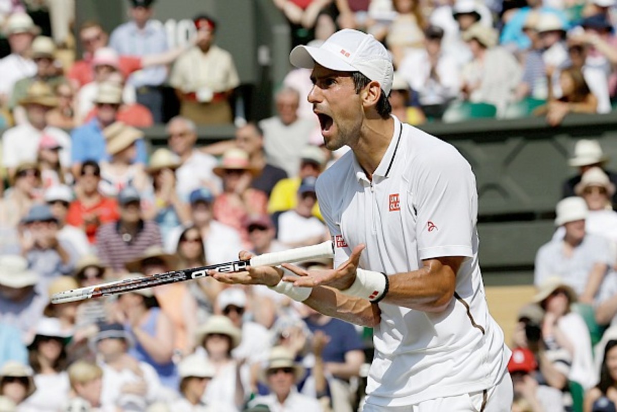Novak Djokovic argues with the chair umpire in the second set. (Getty Images)