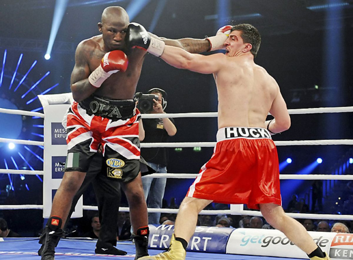 Ola Afolabi and Marco Huck know one another well, and the two will battle again on June 8 in Berlin. [Jens Meyer/AP]