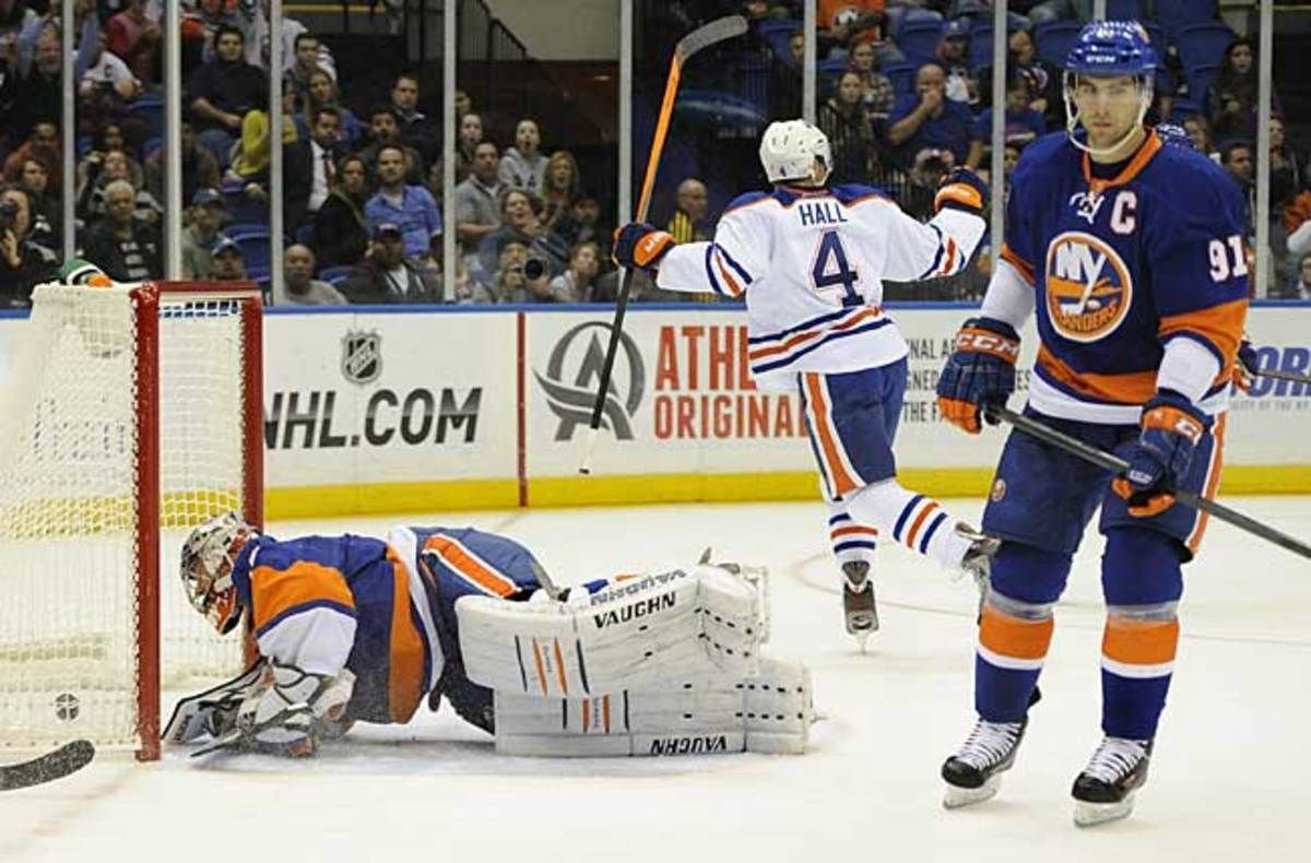 Taylor Hall and John Tavares (91) are cornerstones of their teams' efforts to recapture lost glory.