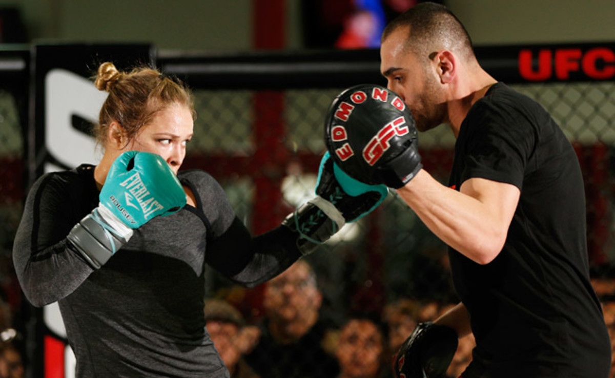Ronda Rousey works out with trainer Edmond Tarverdyan as she prepares for her UFC 157 fight.