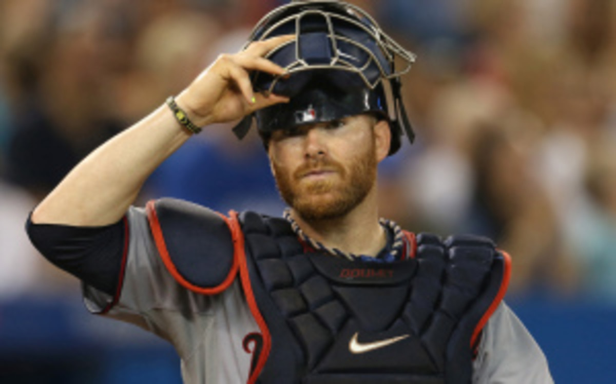 Twins catcher Ryan Doumit appears headed to the 7-day DL after experiencing concussion-like symptoms in Wednesday's loss to the Royals. (Tom Szczerbowski/Getty Images)
