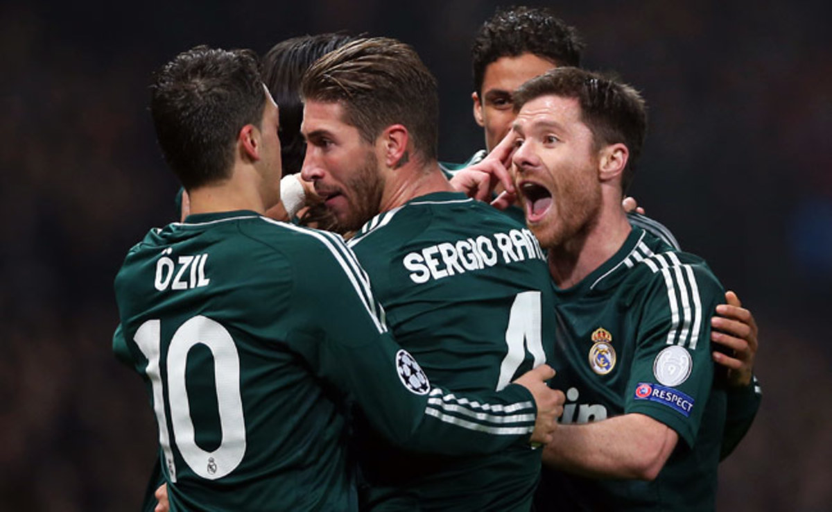 Real Madrid's players celebrate after taking a 2-1 lead against Manchester United on Tuesday.