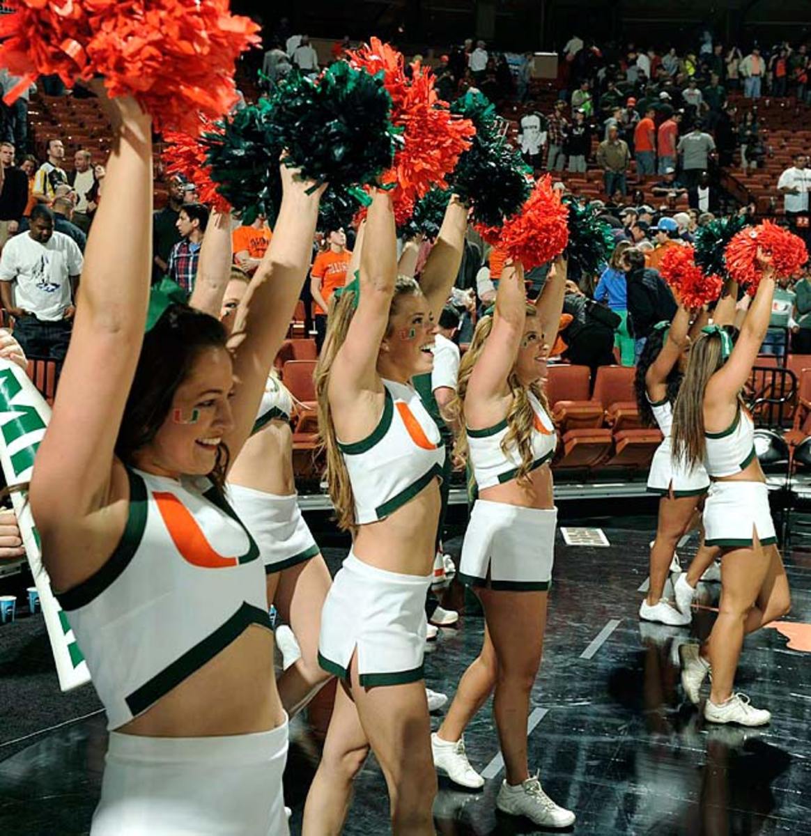 Albums 95+ Images hurricanes cheerleaders posing with a group of aggies Completed
