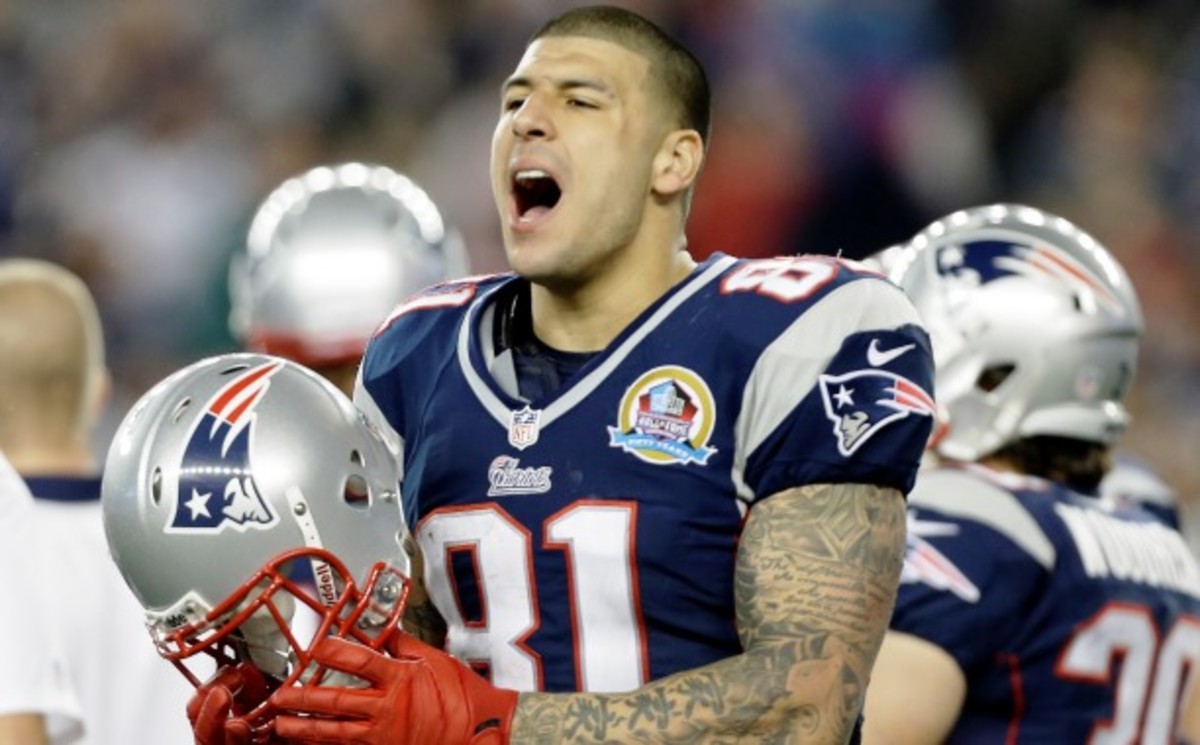 Aaron Hernandez could be claimed off waivers by any of the 31 other teams in the league. (Elise Amendola, AP)