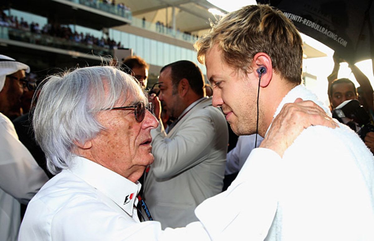 Formula One President Bernie Ecclestone (with Sebastian Vettel) iis accused of making a corrupt deal.