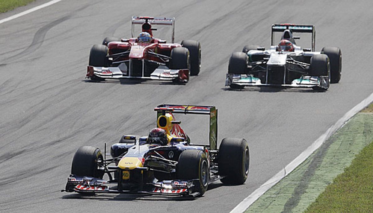 Sebastian Vettel (front) has extended his points lead heading to the race at Monza.