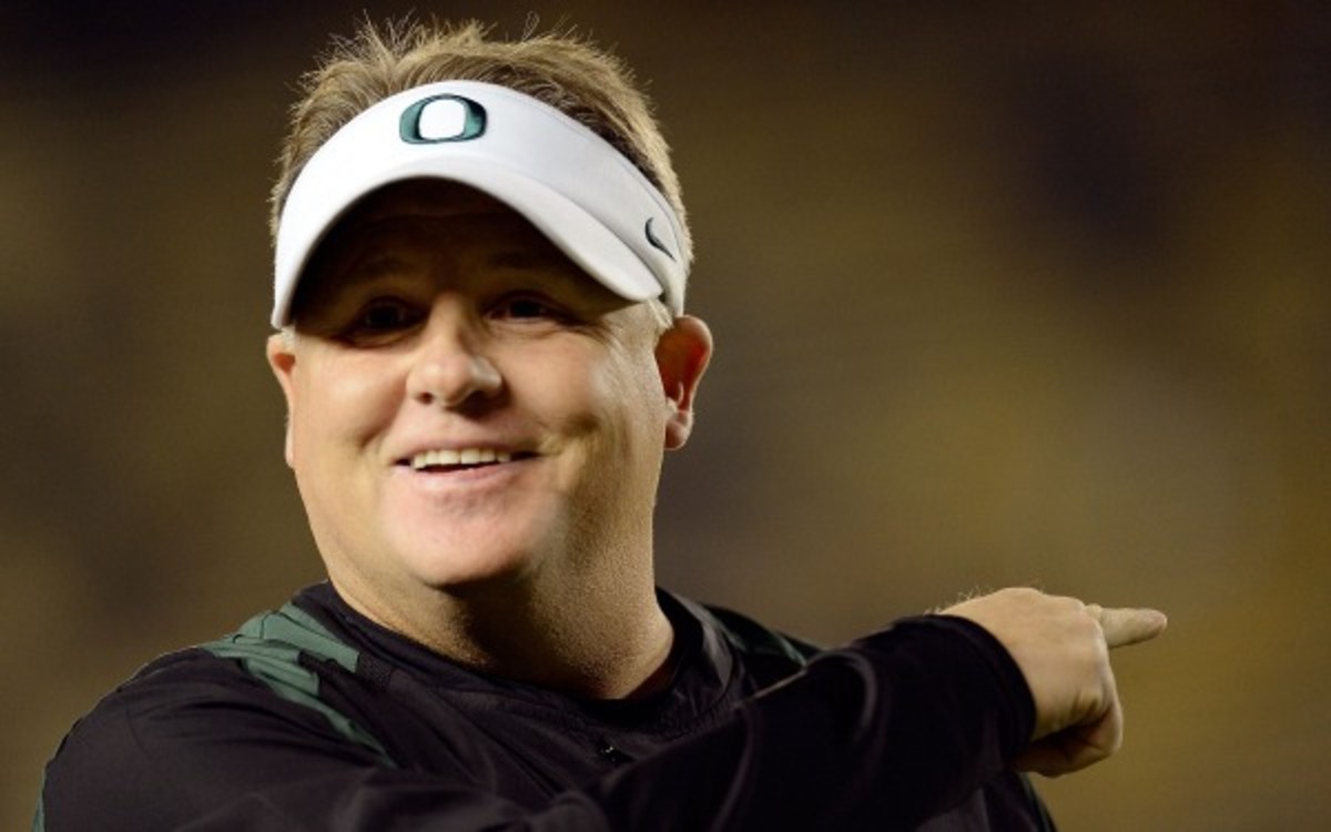 Eagles coach Chip Kelly will try to bring his up-tempo offense from Oregon to the NFL. (Thearon W. Henderson/Getty Images)