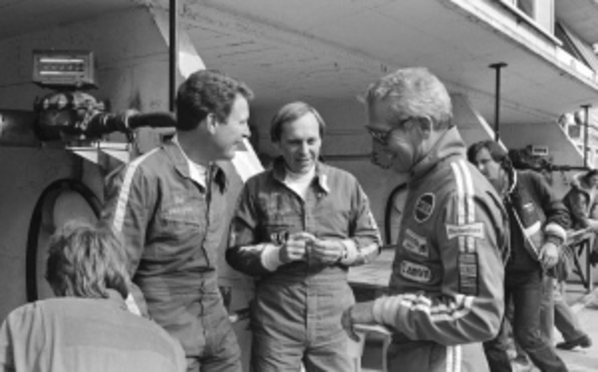 Don and Bill Whittington chat with film star Paul Newman during their 1979 win at France's 24-hour Le Mans. The brothers used a Porsche 935 Turbo for the race. (AP Photo/Bodini)