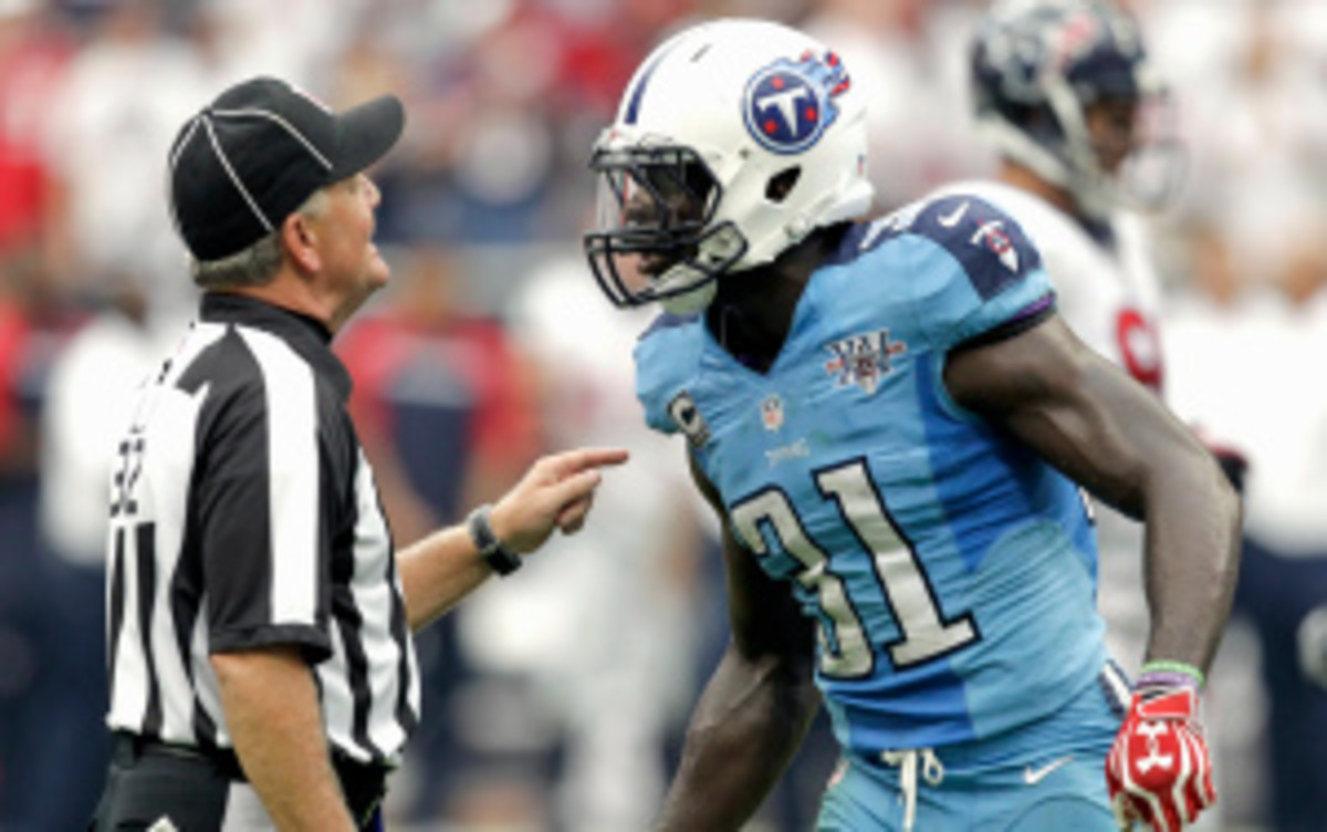 Titans safety Bernard Pollard was one of two players fined $42,000 for an illegal hit in Sunday's game vs. the Texans. (Bob Levey/Getty Images)