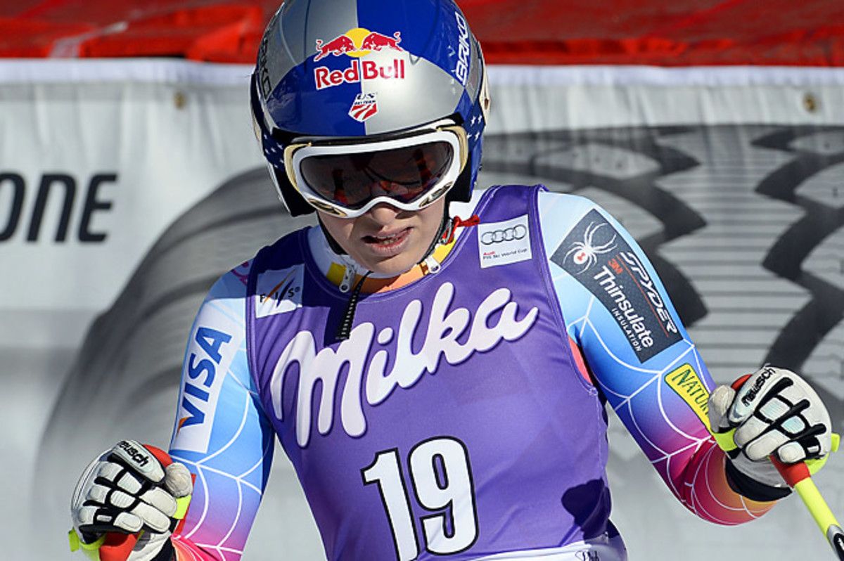 Lindsey Vonn clutched her knee in pain but said she did not do further damage to her surgically repaired knee.