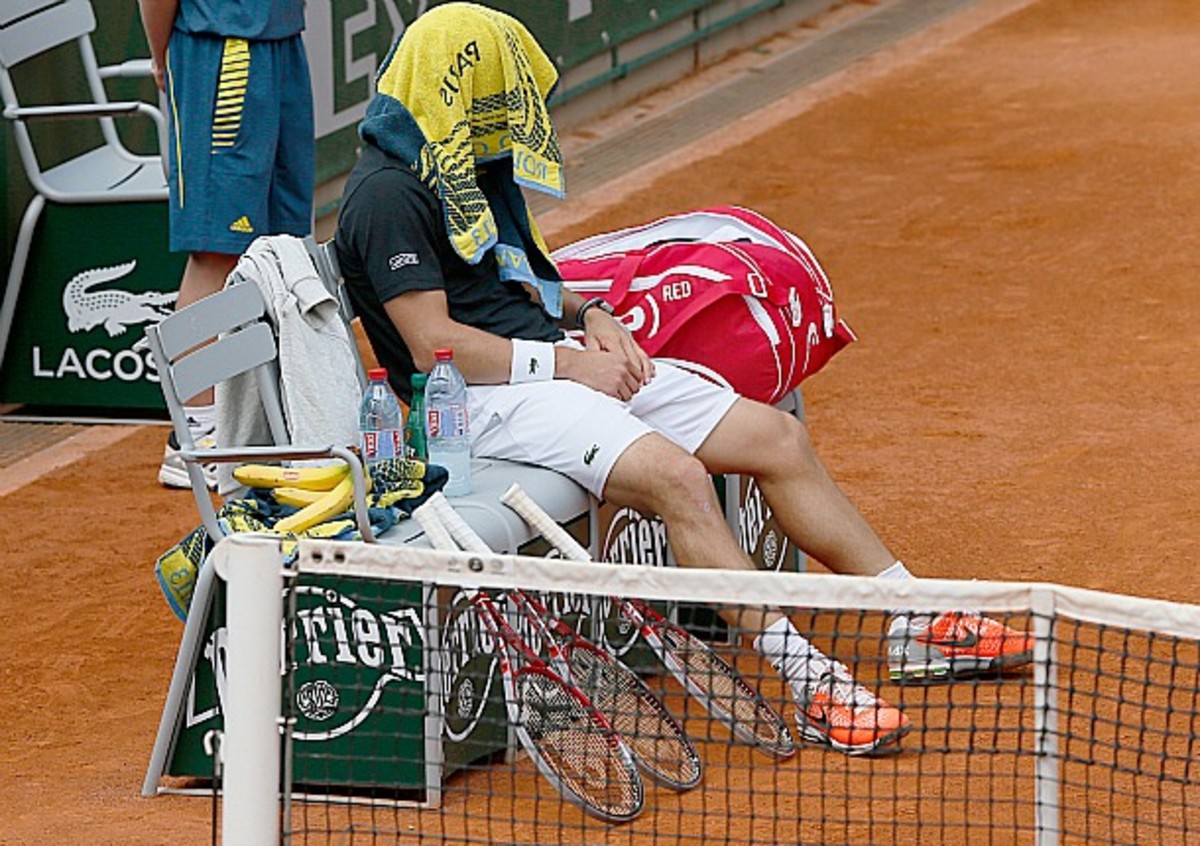 Pablo Cuevas takes a timeout in his loss to Gilles Simon (Patrick Kovarik/AFP/Getty Images)