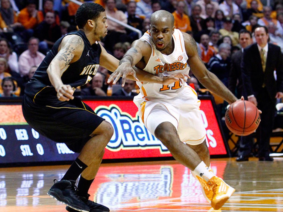 Senior point guard Trae Golden's transfer isn't the only issue facing Tennessee athletics. (Wade Payne/AP)
