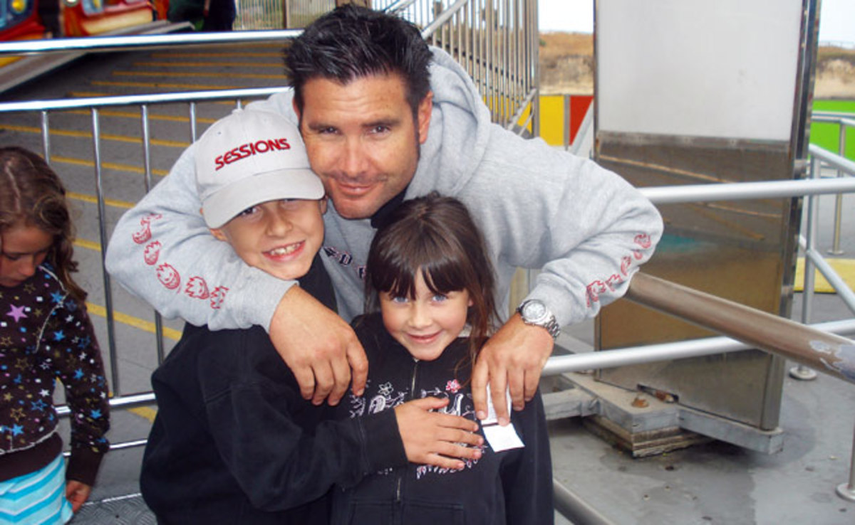 Bryan Stow, pictured here with his children prior to the 2011 attack, returned home on Wednesday.