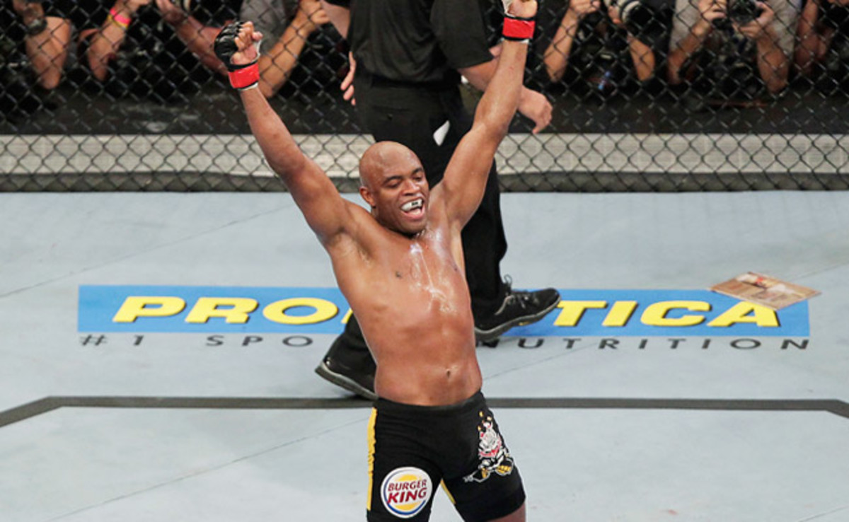 Anderson Silva celebrates after once again successfully defending his UFC middleweight title -- this time against Yushin Okami in August 2011.