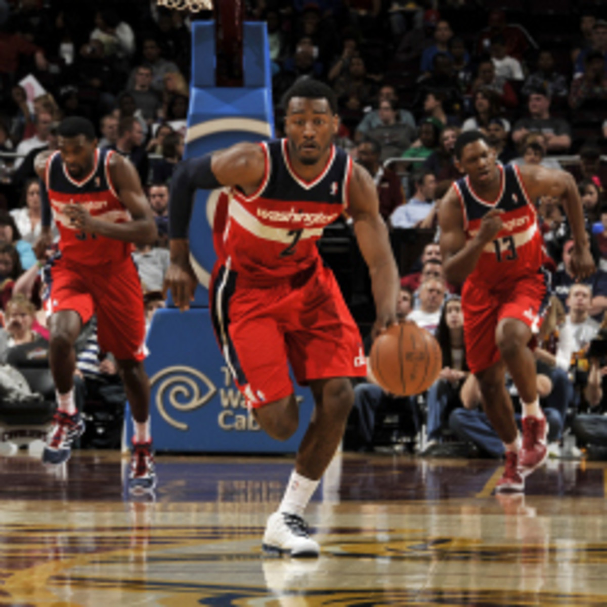 John Wall thinks he's the NBA's fastest player; he considered Russell Westbrook, Derrick Rose, Mike Conley and Ty Lawson to be quick also. (David Liam Kyle/Getty Images)