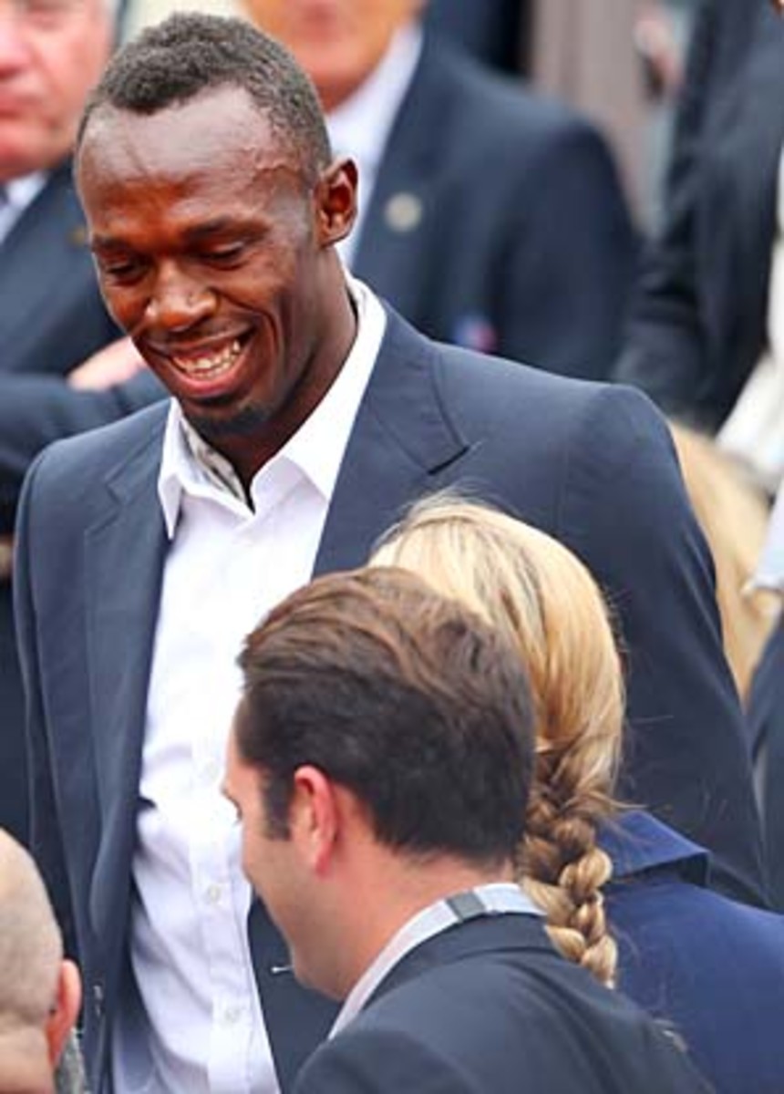 Usain Bolt will present the men's singles trophy to the winner. (Michel Euler/AP)