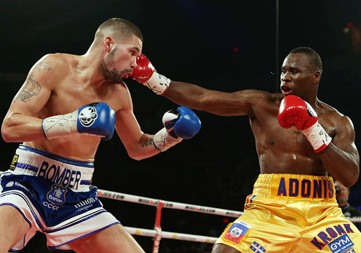 Adonis Stevenson (right) took out Tony Bellew in retaining his WBC light heavyweight title.