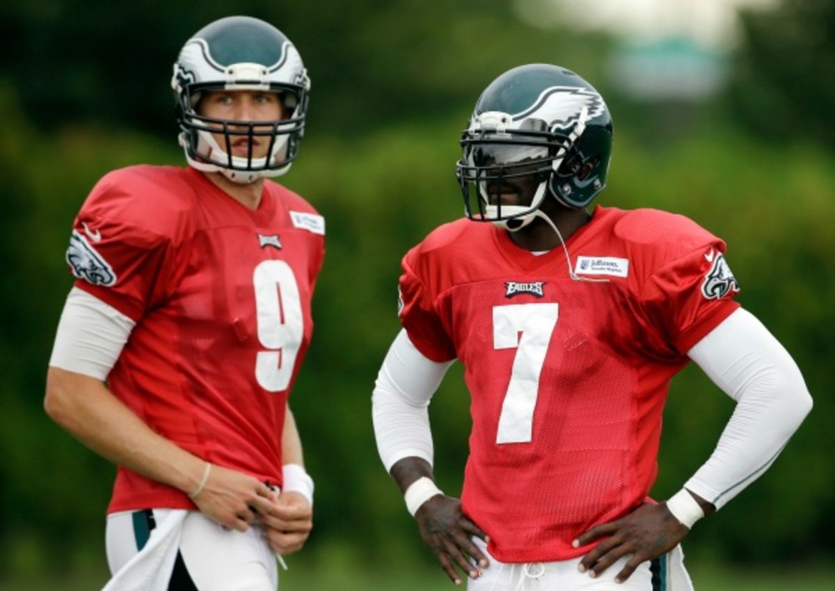 Nick Foles and Michael Vick are competing for the Eagles' starting quarterback job. (AP)