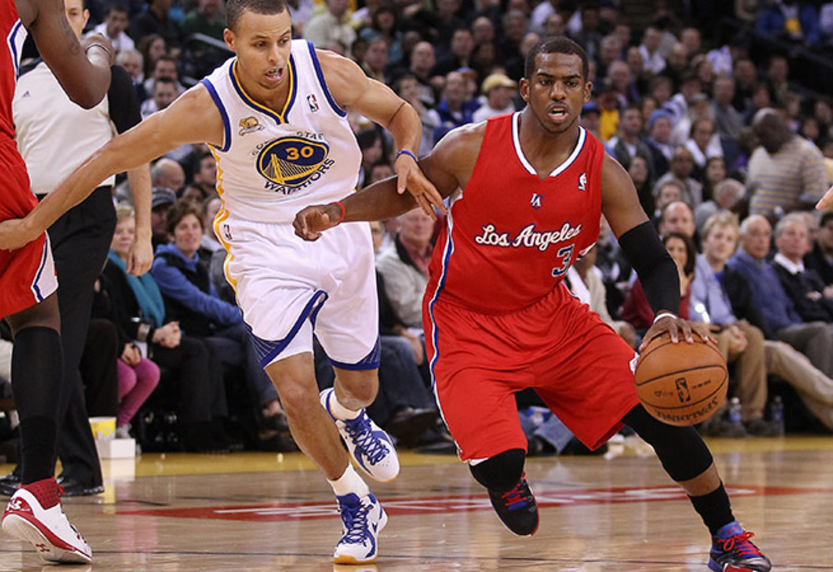 With the Lakers fading, Stephen Curry (left) and Chris Paul become the new faces of the Pacific Division.