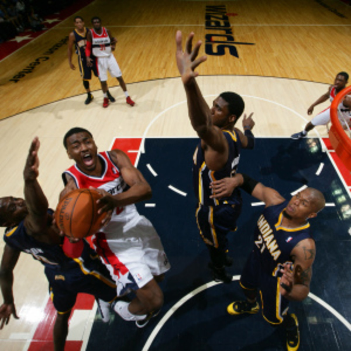 John Wall and Roy Hibbert cleared up some things after a exchange of words through the media. (Ned Dishman/Getty Images)