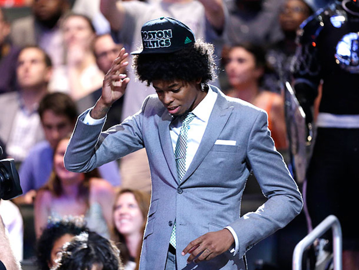 Lucas Nogueira's hair won its battle with his Celtics cap in emphatic fashion. 