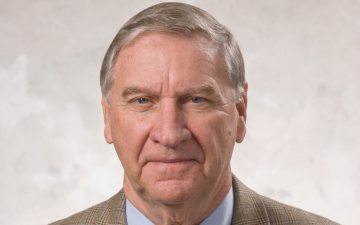 Two men were charged with prank calling former Bills GM Buddy Nix (pictured) and Bucs GM Mark 