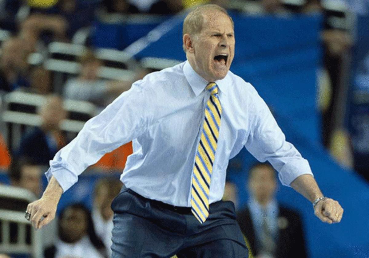John Beilein was 0-9 in games against Jim Boeheim -- until Saturday. (SI)