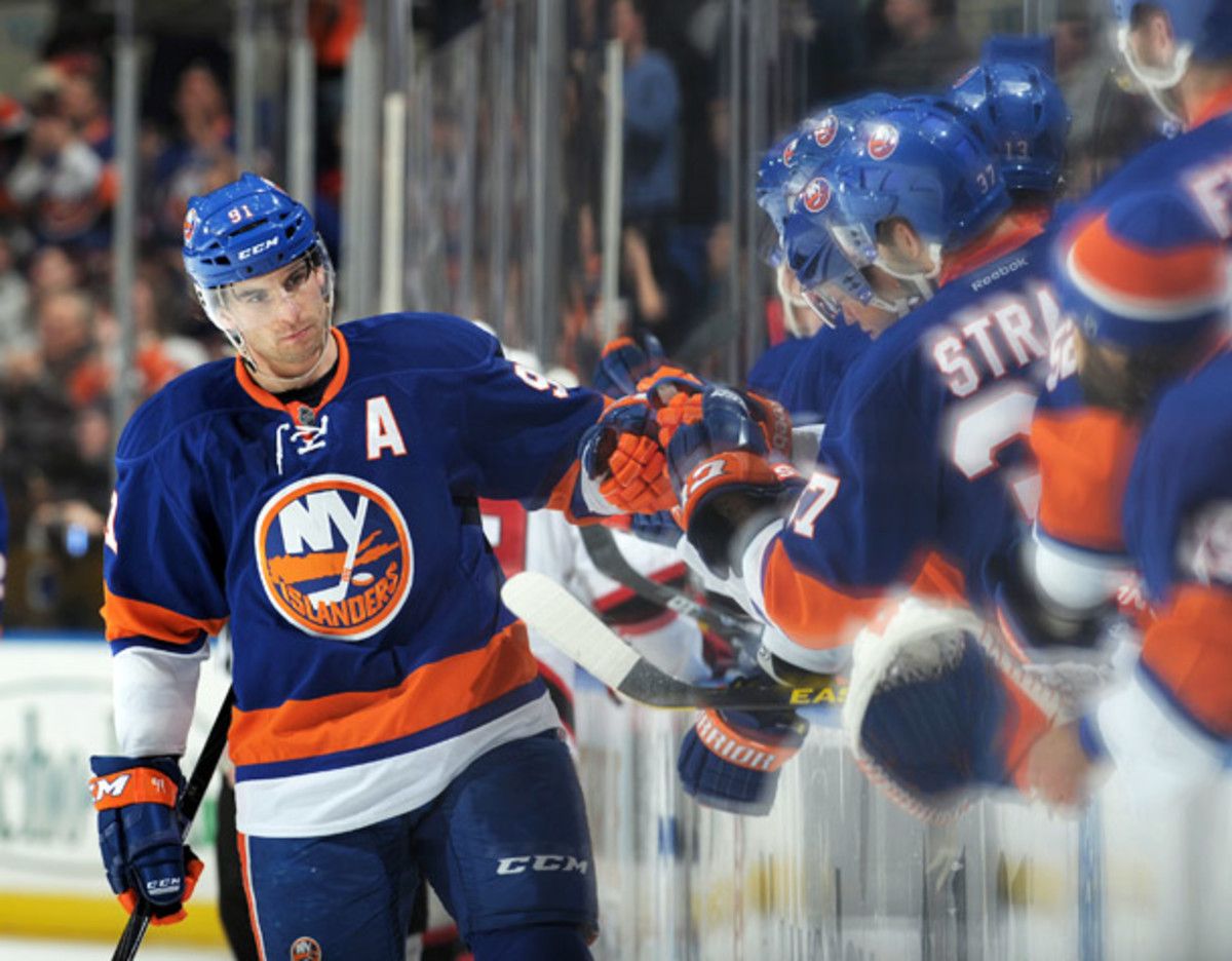 John Tavares scored a hat trick, as the Islanders defeated the Devils 5-1. (Christopher Pasatieri/ Getty Images)