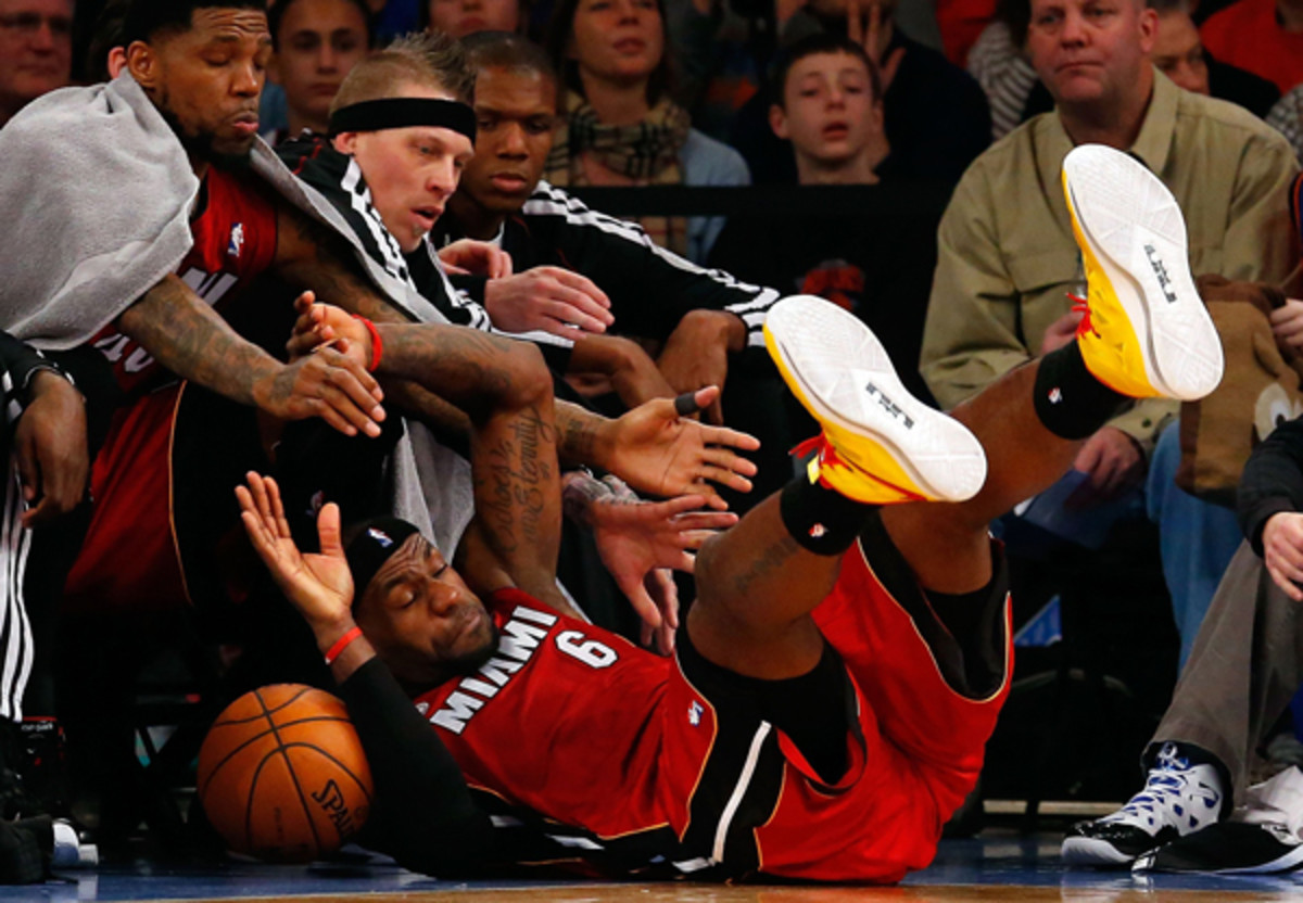 LeBron James denies that he simulates fouls. (Jim McIsaac/Getty Images)