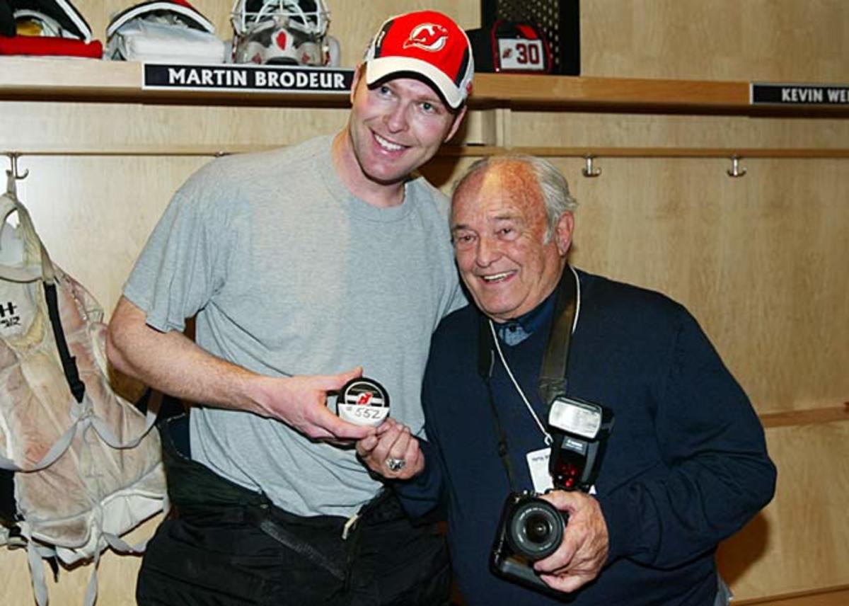 New Jersey Devils goalie Martin Brodeur with his father, Denis, in March 2009. Denis has died at 82.