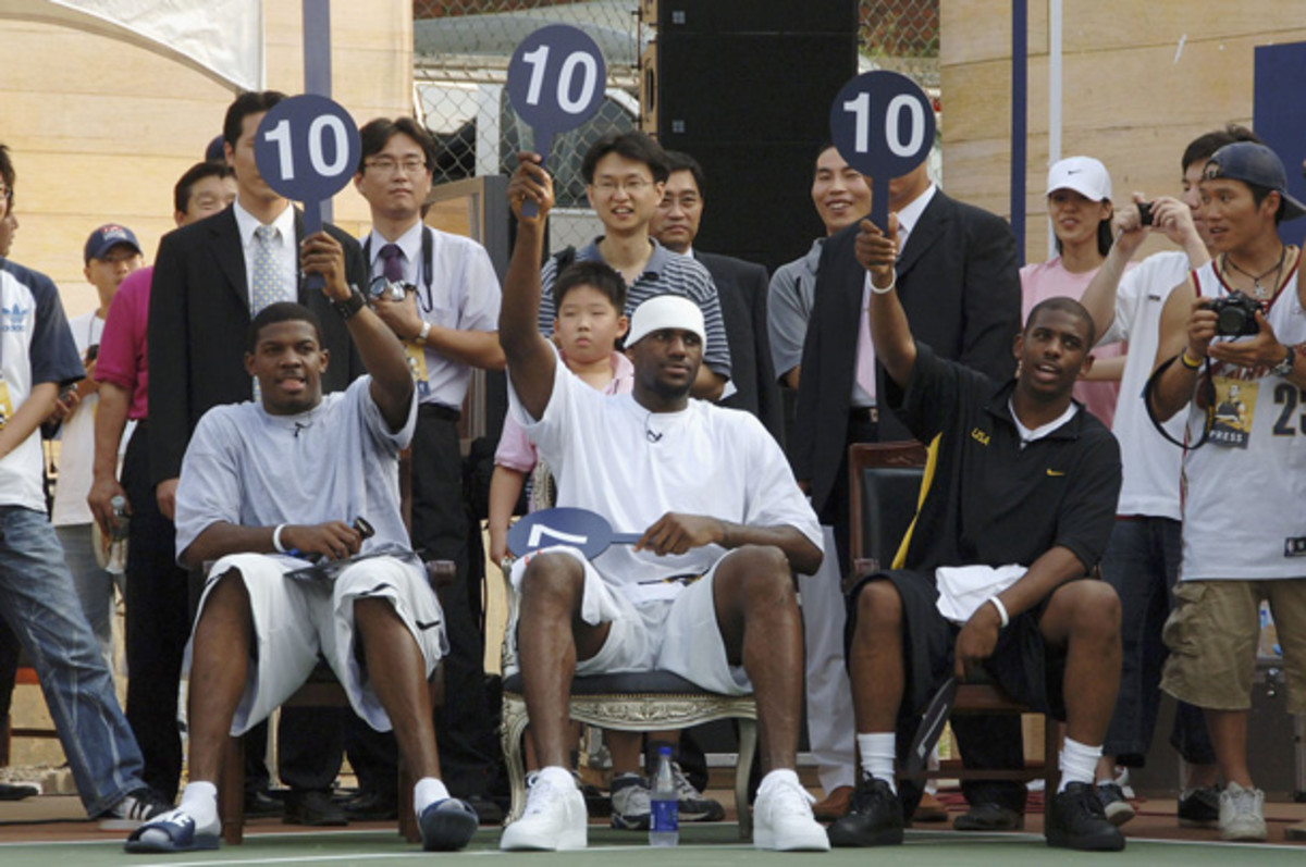 LeBron James, middle, will be on the sidelines during the 2013 Slam Dunk Contest. (Noah Graham/Getty Images)