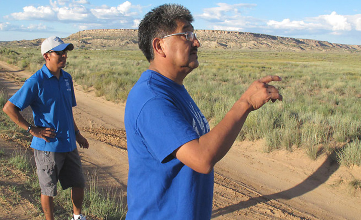 Rick Baker watches his team's grueling training, which ties to the sacredness of running in Hopi culture.