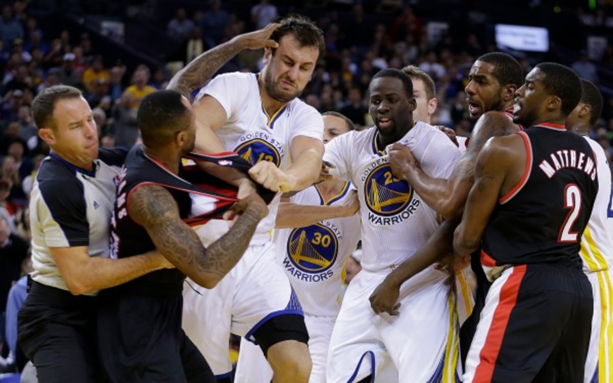 Andrew Bogut and Mo Williams will both miss one game for their role in Saturday's fight. (AP Photo/Ben Margot)