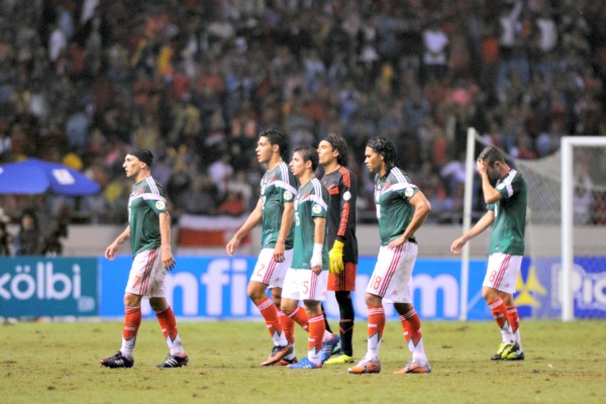 In jeopardy of not making the World Cup for the first time since 1990, Mexico got help from its neighbors to the north. (Johan Ordonez/Getty Images)