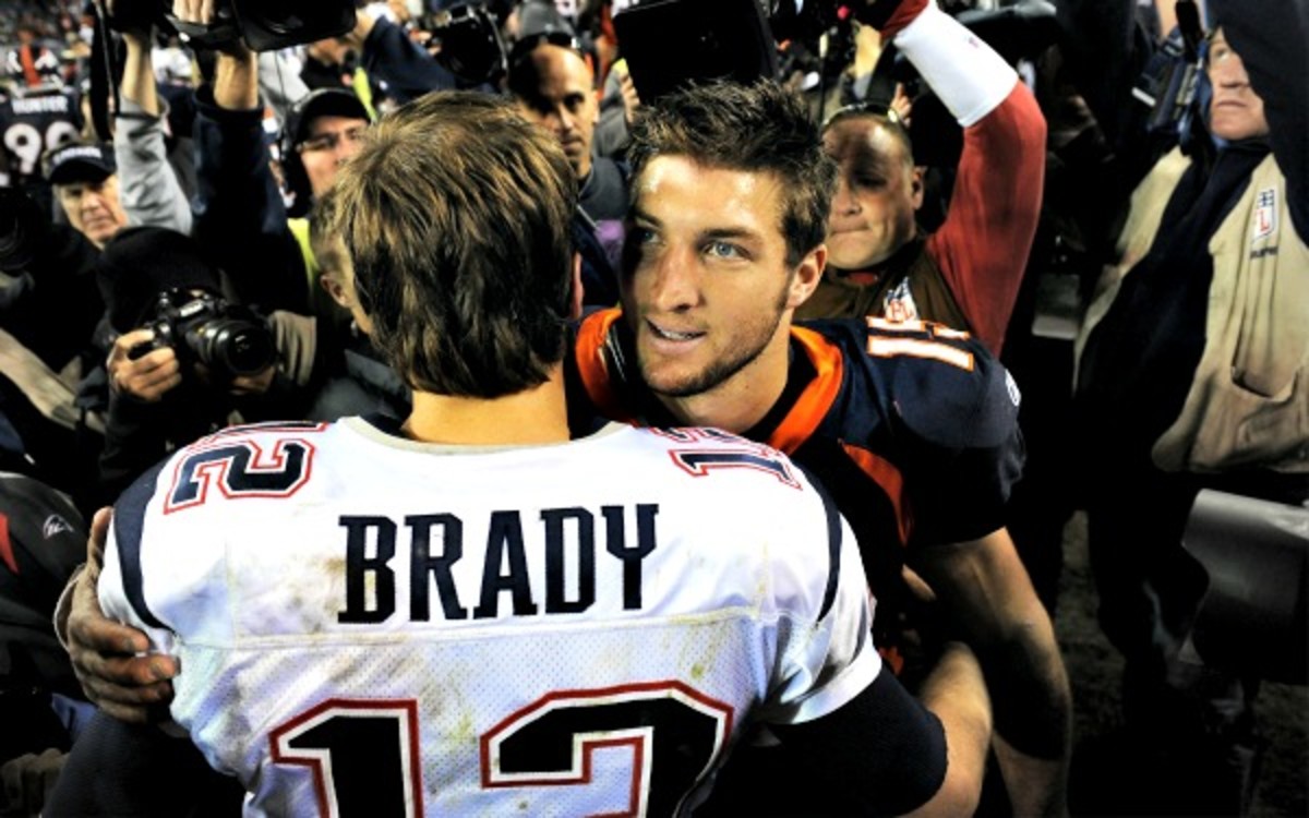 Tom Brady briefly spoke with Tim Tebow following the Patriots-Broncos game in Week 15 of the 2011 season. (Patrick Smith/Getty Images)