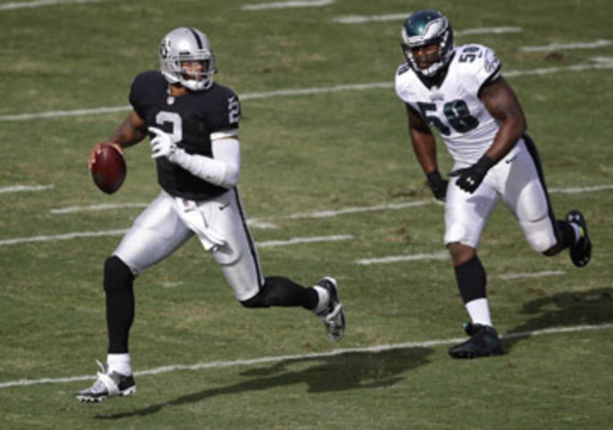 Trent Cole chasing after Terrelle Pryor last Sunday (Marcio Jose Sanchez/AP)