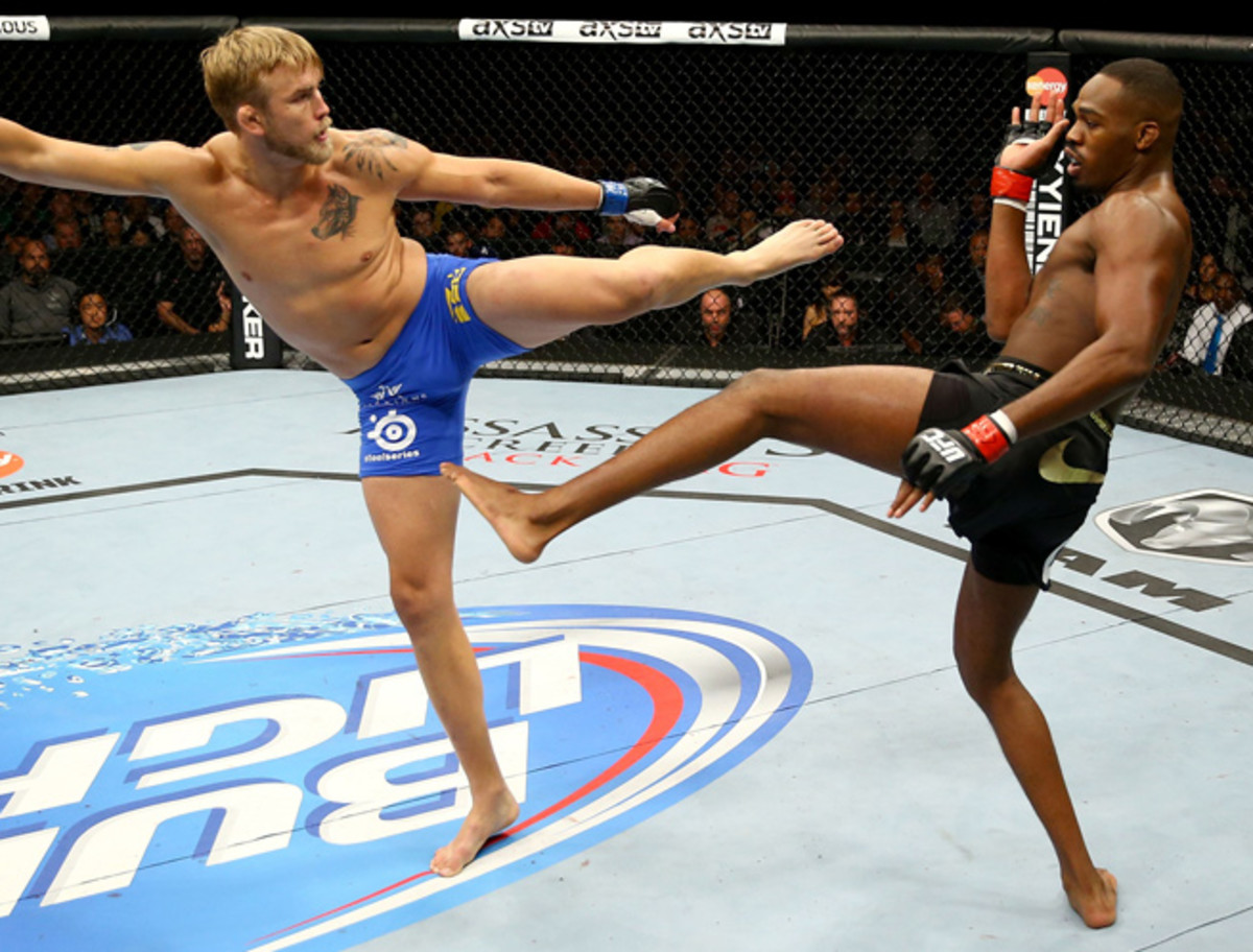 Jon Jones (right) and Alex Gustafsson went five rounds in their title fight at UFC 165.